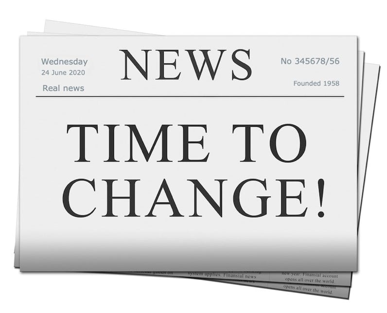 Newspaper headline which reads Time to Change.